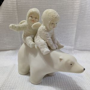 Snowbabies riding polar express bear figure